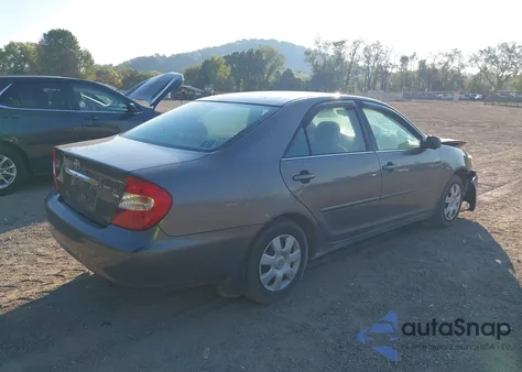 2002 Toyota Camry Le z USA, uszkodzony, nr VIN 4T1BE32K32U580541